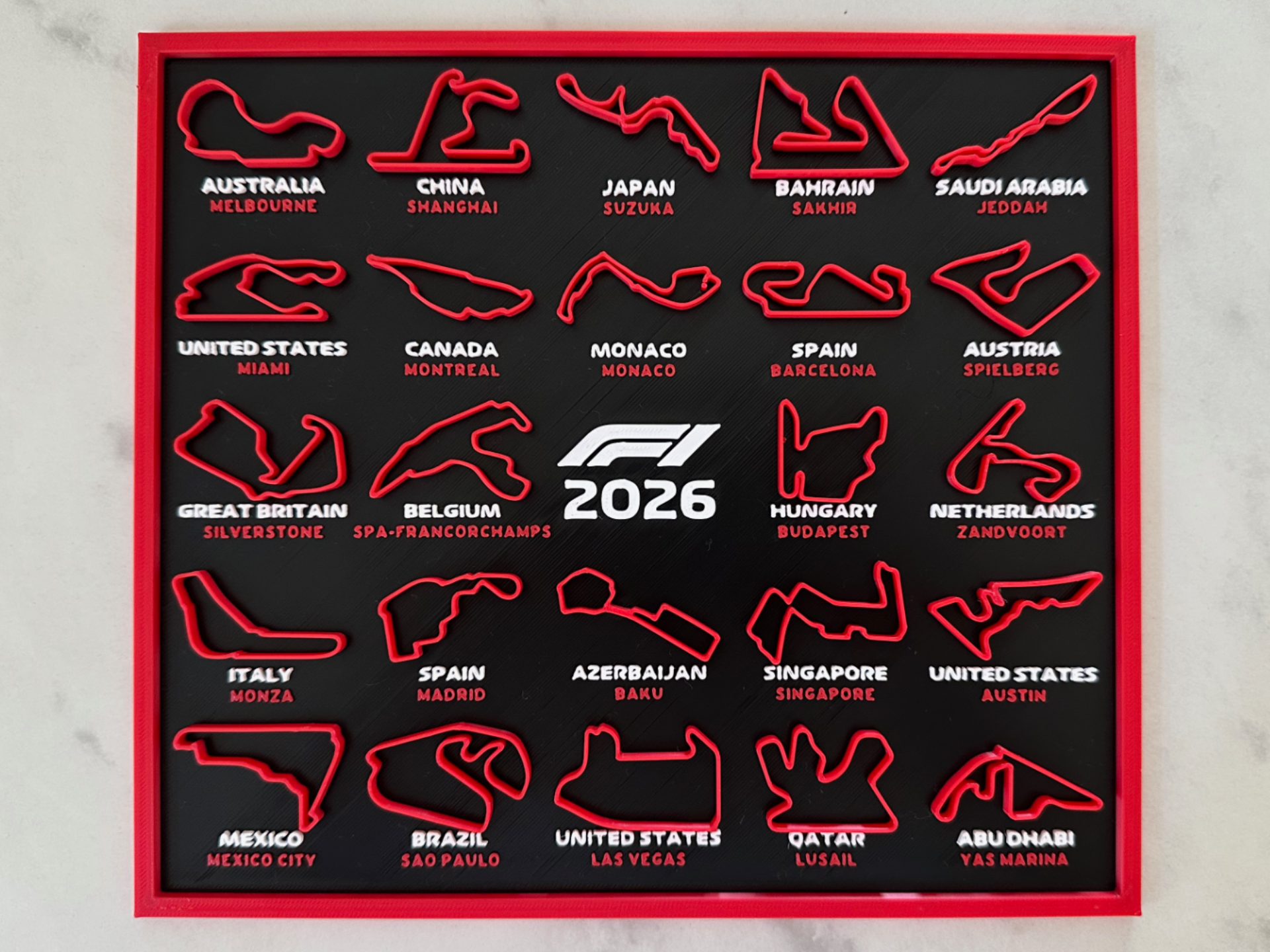 F1 starter pack featuring a Formula 1 themed calendar and coaster set. Aesthetic, functional, and perfect for racing fans, desk setups, and unique gifting.